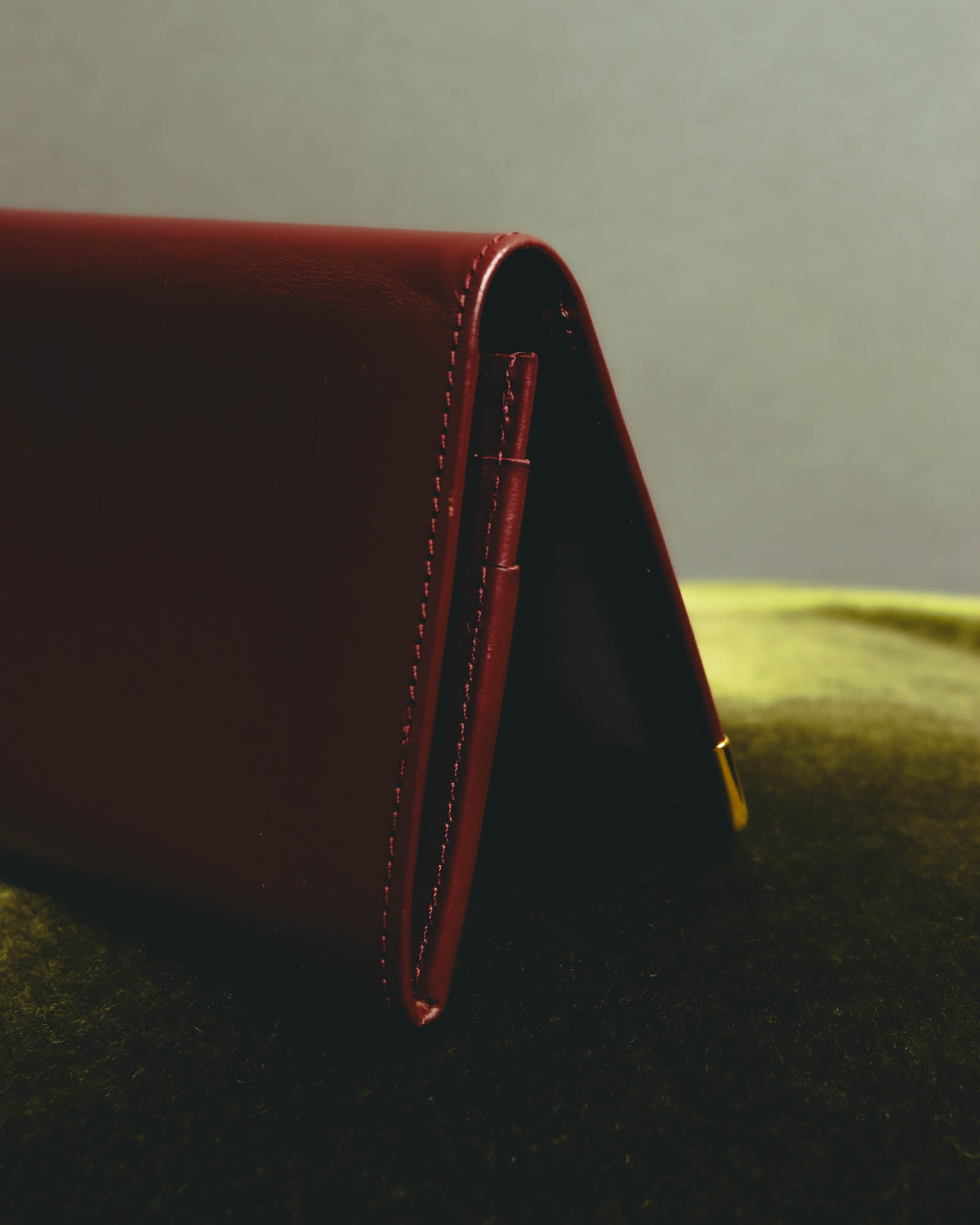 “Cartier” 90’s Must de Cartier burgundy embossed leather bifold wallet