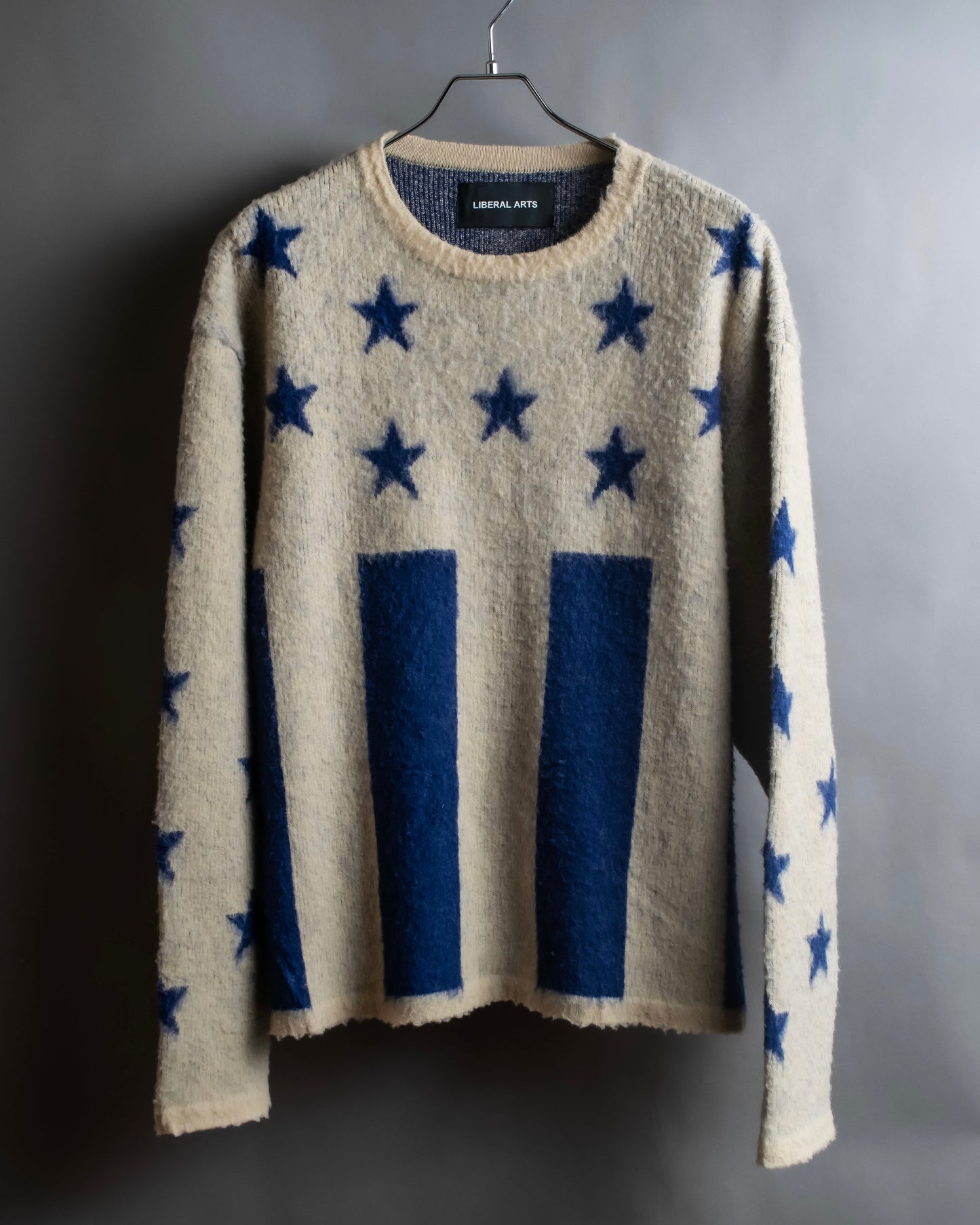 "LIBERAL ARTS" Star pattern oversized knit pullover