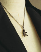 "Saint Laurent" 10's-20's Sculptural doll pendant necklace