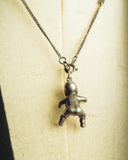 "Saint Laurent" 10's-20's Sculptural doll pendant necklace