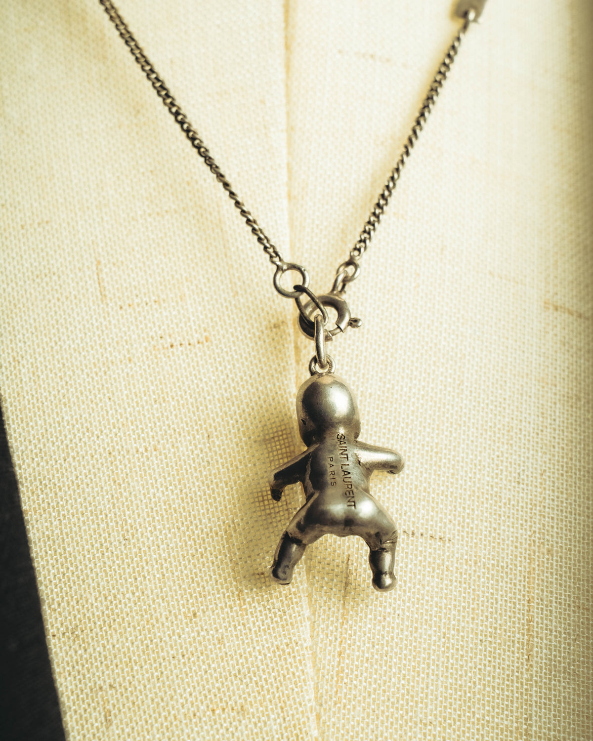 "Saint Laurent" 10's-20's Sculptural doll pendant necklace