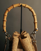 “Heidi Klein” Natural raffia bamboo handle bucket bag