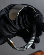 "Christian Dior" Ribbed design gold combination polished silver bangle