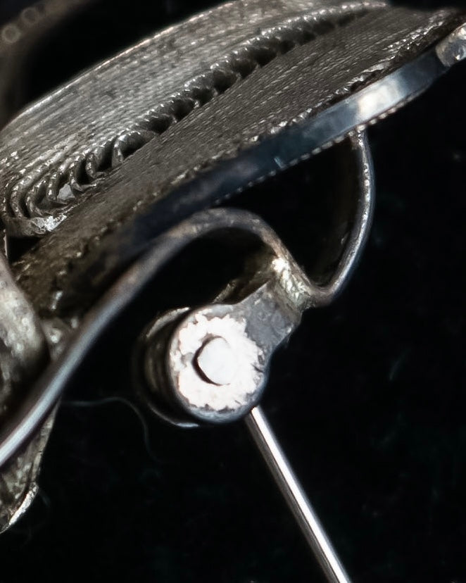 "Vintage petal motif broach"