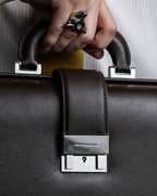 "BURBERRY" Metal belt design embossed PVC briefcase