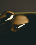 "Yves Saint Laurent" 80's-90's Sculptural gold tone clip-on earrings
