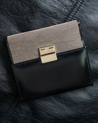 "GUCCI" Canvas and leather bi-fold wallet