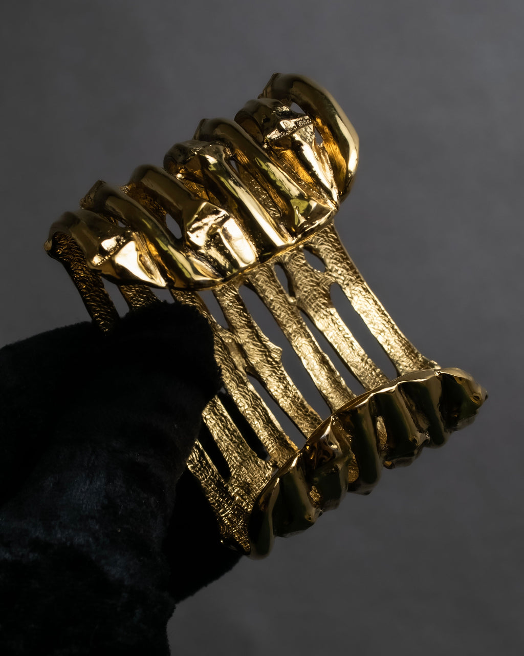 "YVES SAINT LAURENT" Skeletal arm shape design gold bangle