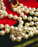 "Salvatore Ferragamo" 80's-90's Gancini three-strand pearl-style necklace