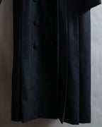 Tight-waisted wool shirt and black coat