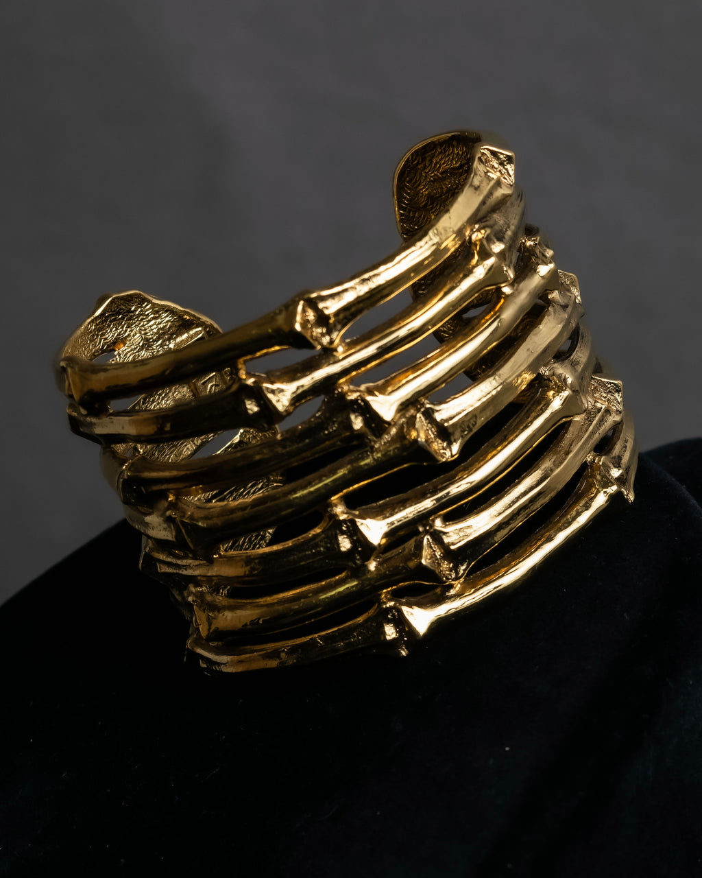 "YVES SAINT LAURENT" Skeletal arm shape design gold bangle