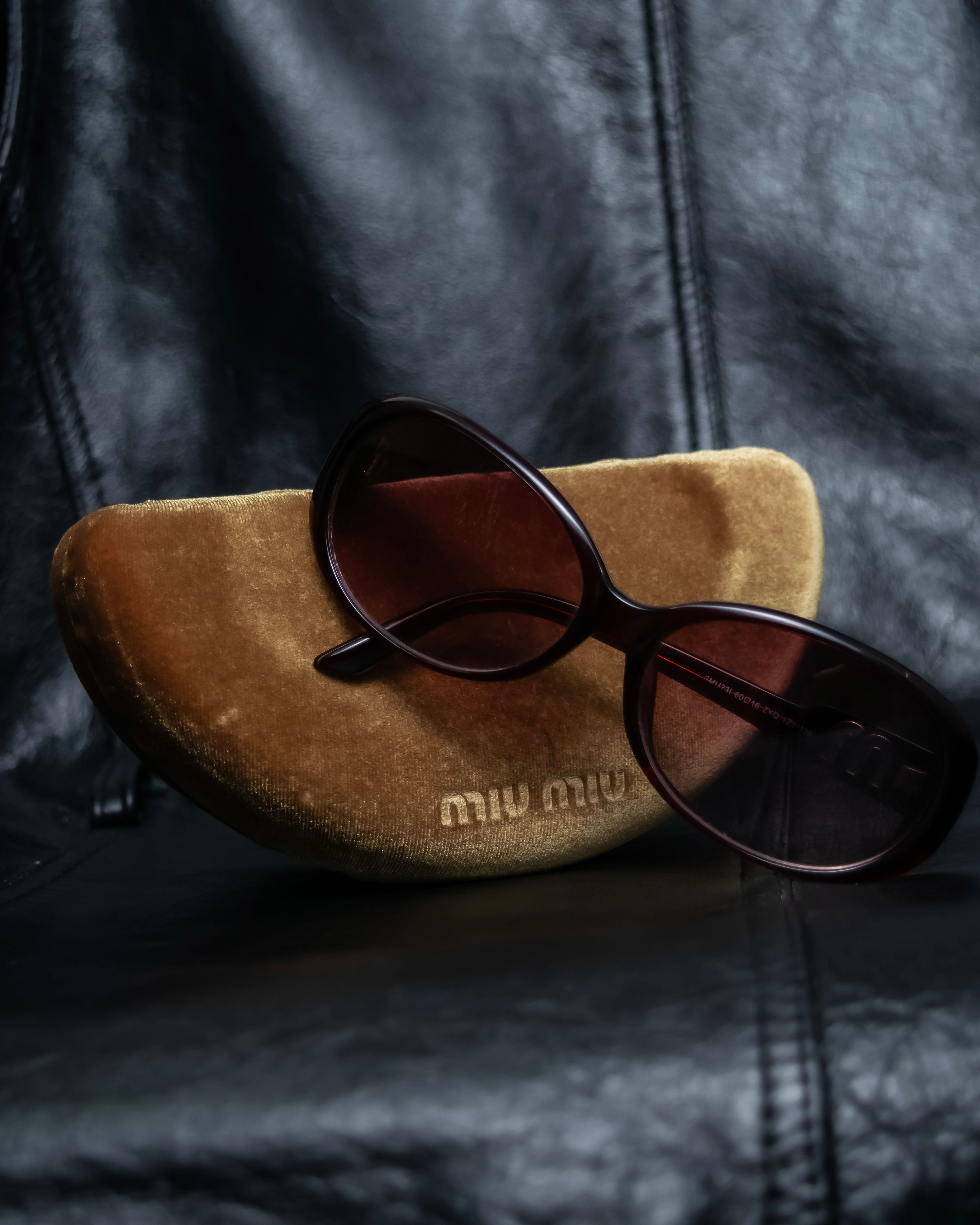 "Miu Miu" reddish brown sporty sunglasses