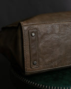 "Mademoiselle Accessories"
 Silver parts design leather one handle bag