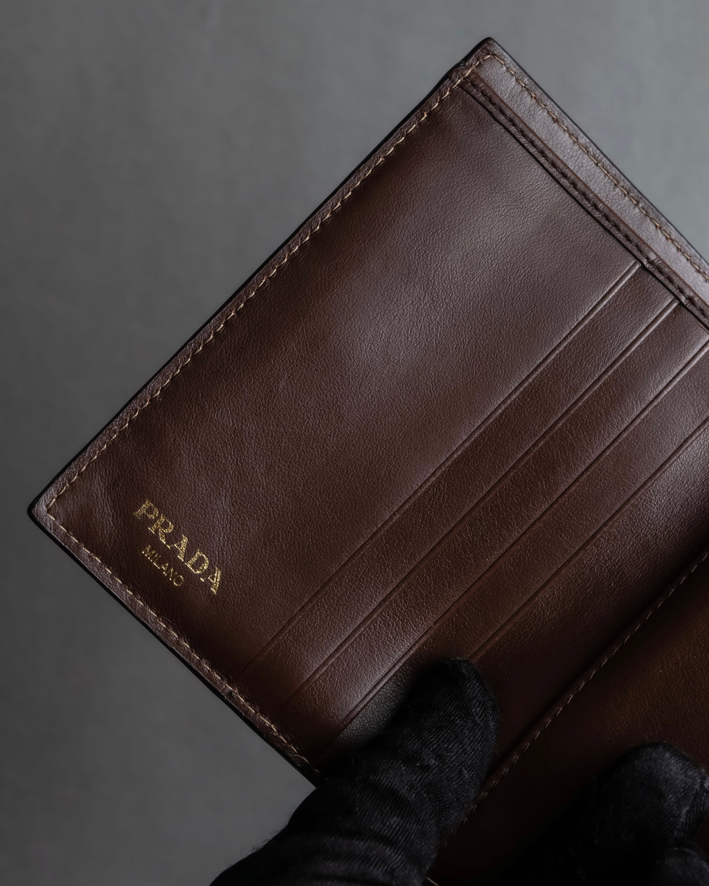 "PRADA" Logo engraved canvas＆leather combination short wallet