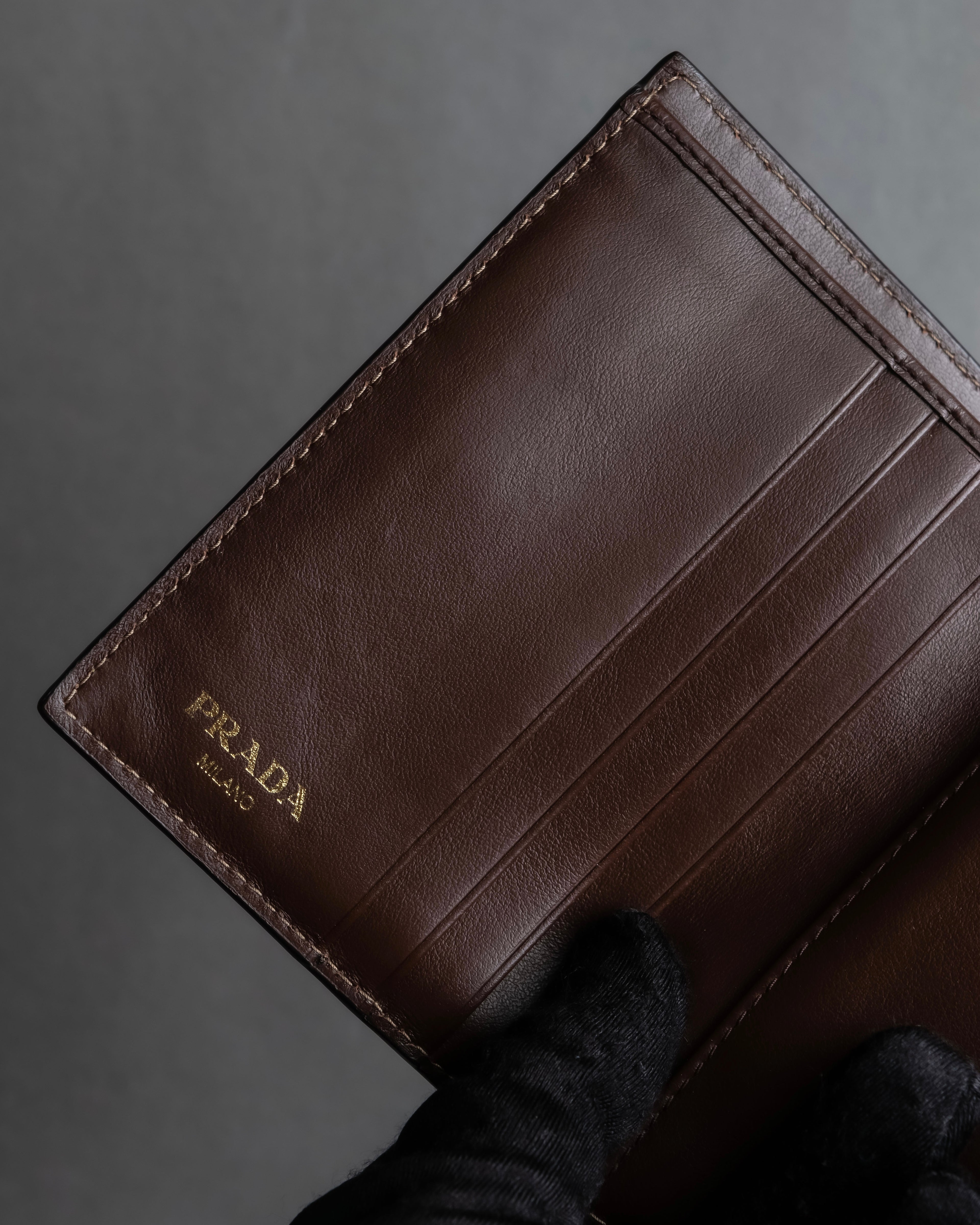 "PRADA" Logo engraved canvas＆leather combination short wallet