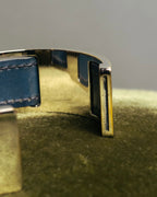 “HERMÈS” 90’s-00’s Leather inset gold metal cuff bangle