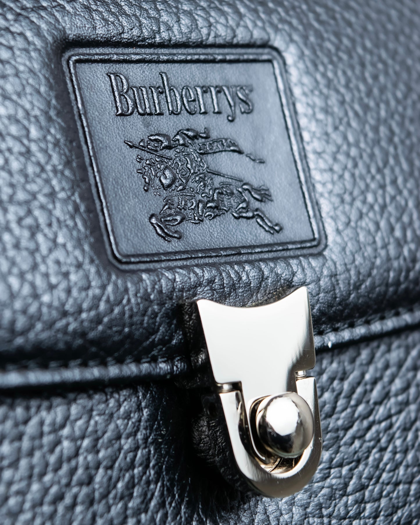 "BURBERRYS" Cylindrical design logo engraved leather one handle bag