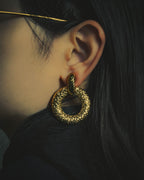 –SPECIAL– "Yves Saint Laurent" 80's-90's Sculptural clip-on hoop earrings