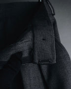 "CHANEL" high-waisted pleated trousers with signature gold button