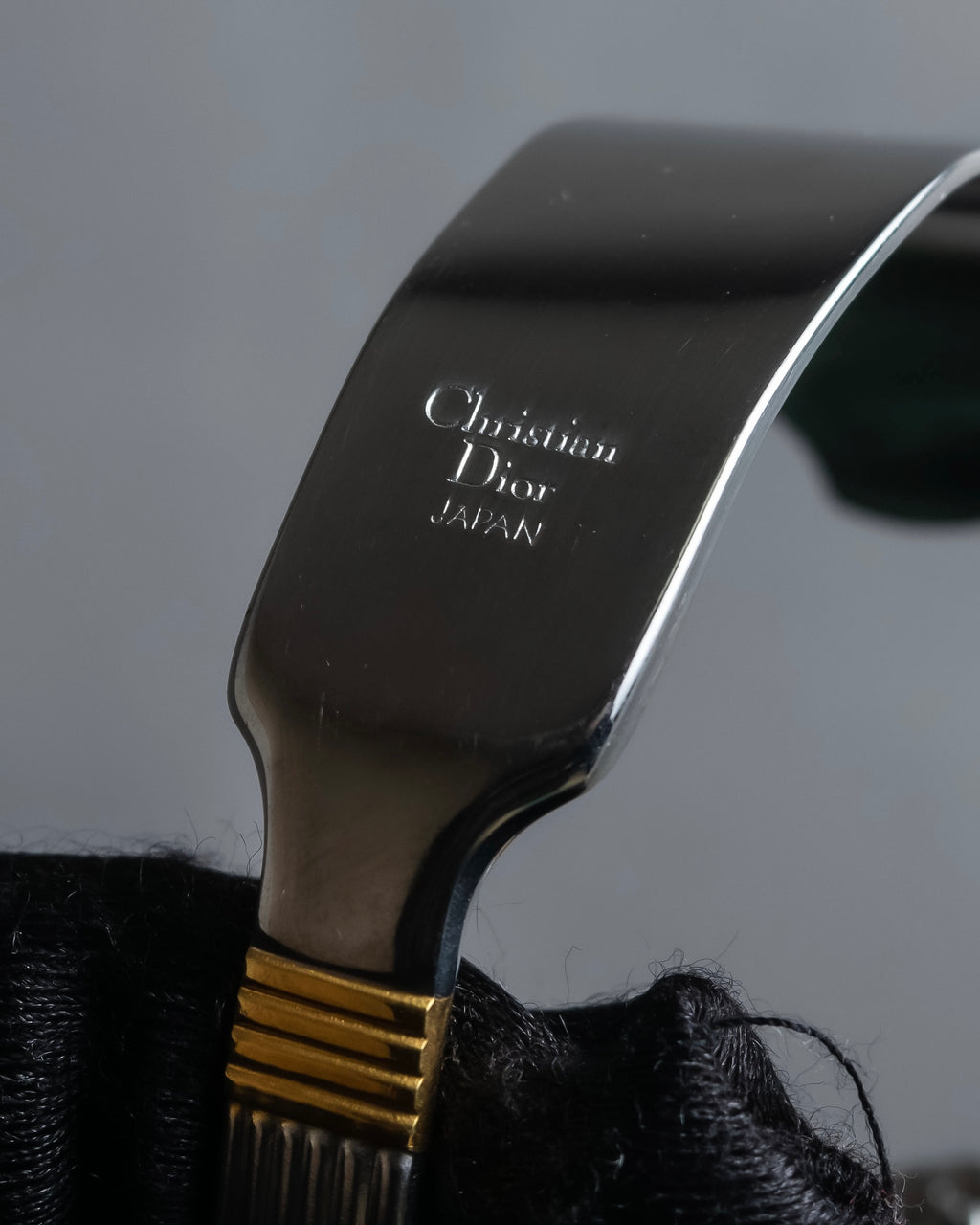 "Christian Dior" Ribbed design gold combination polished silver bangle