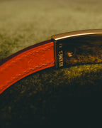 "Hermès" 00's Vibrant orange leather bracelet