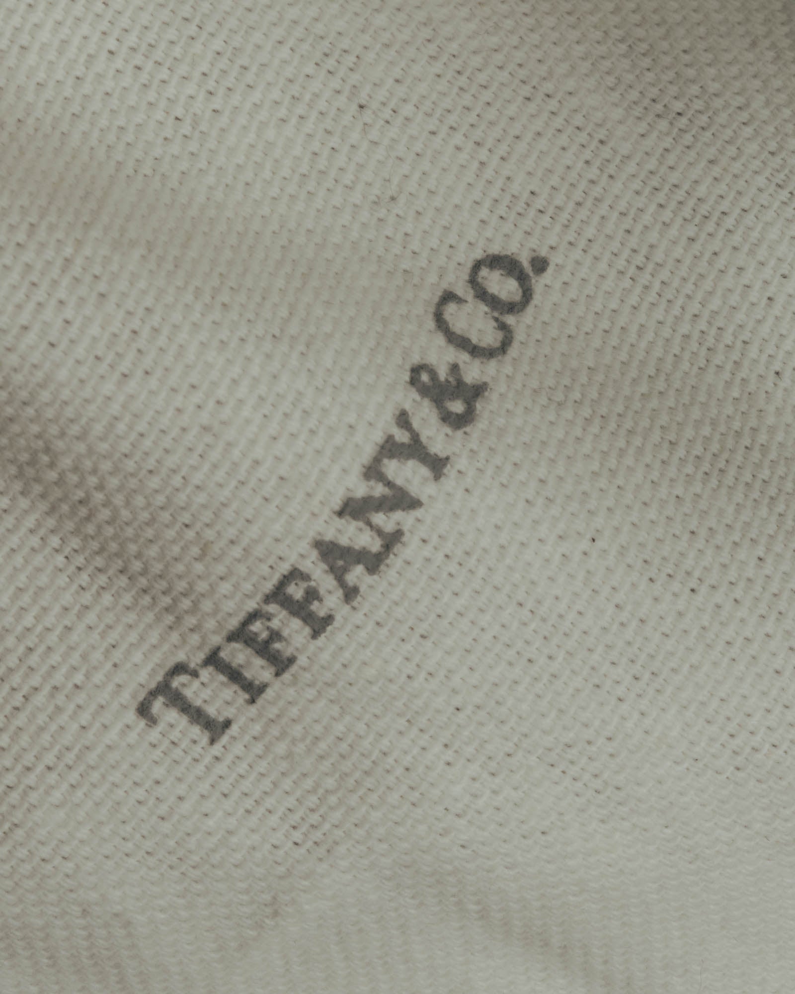 "Tiffany & Co." 10's-20's Embossed leather wristlet wallet