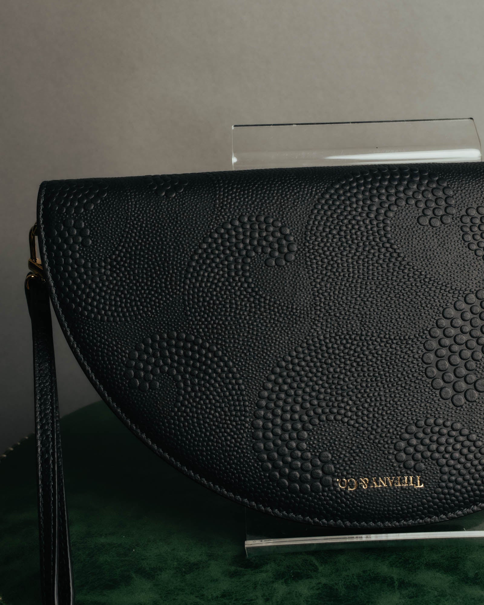"Tiffany & Co." 10's-20's Embossed leather wristlet wallet