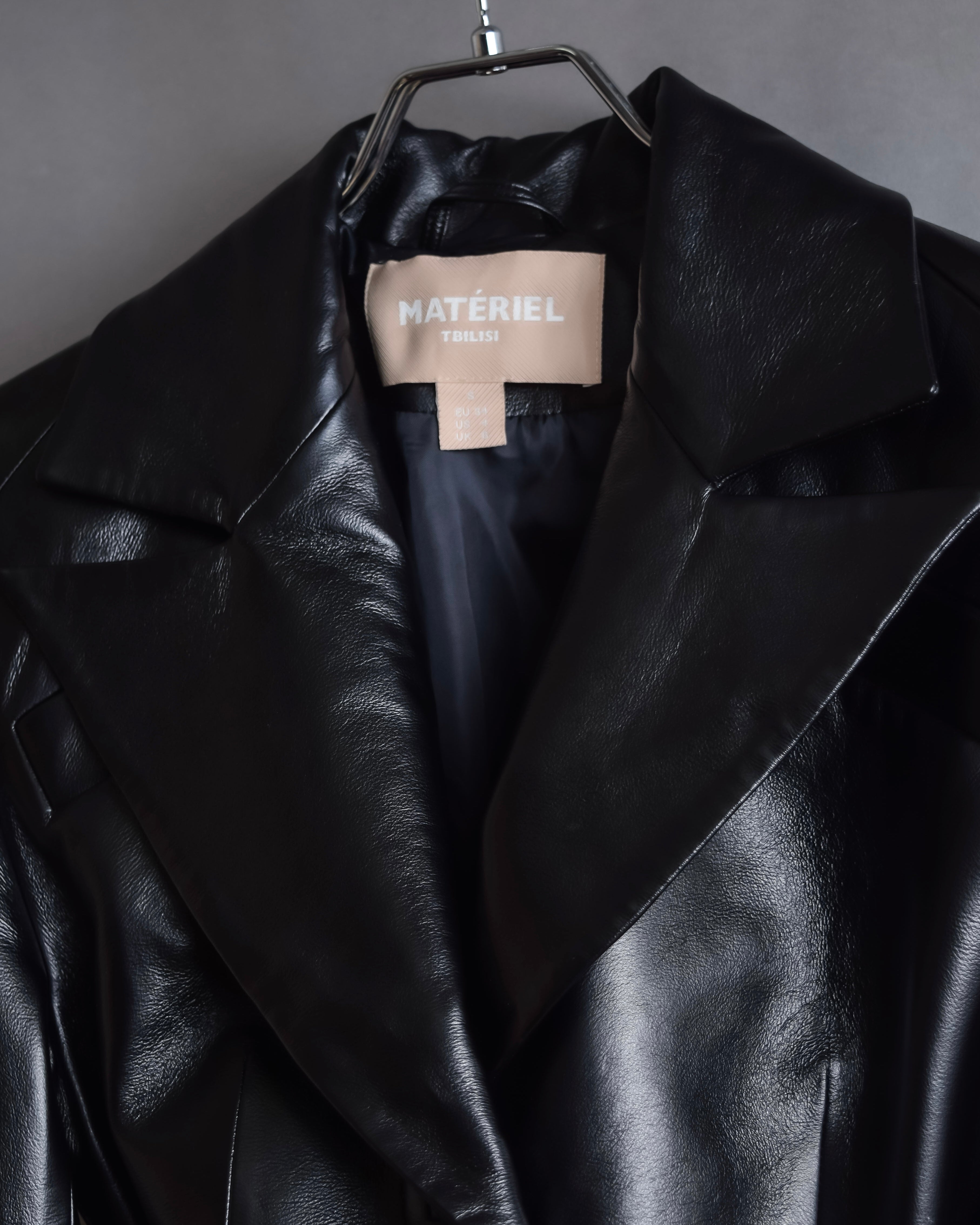 "MATÉRIEL TBILISI" Draped belted synthetic leather long jacket