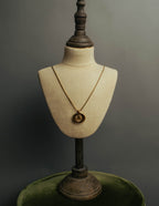 "Christian Dior" 80's-90's Gold logo pendant necklace