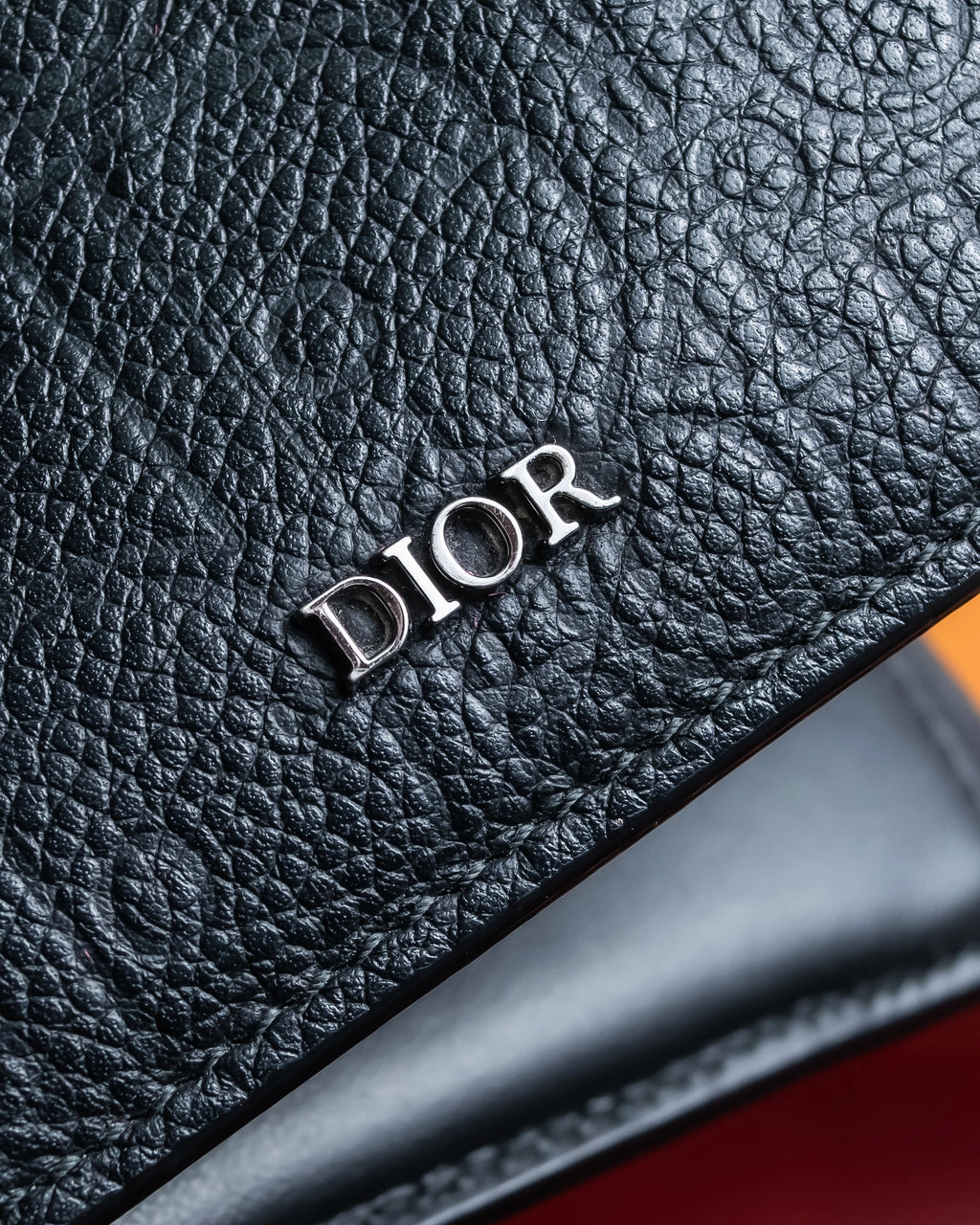 "Dior" Logo engraved bi-fold leather wallet