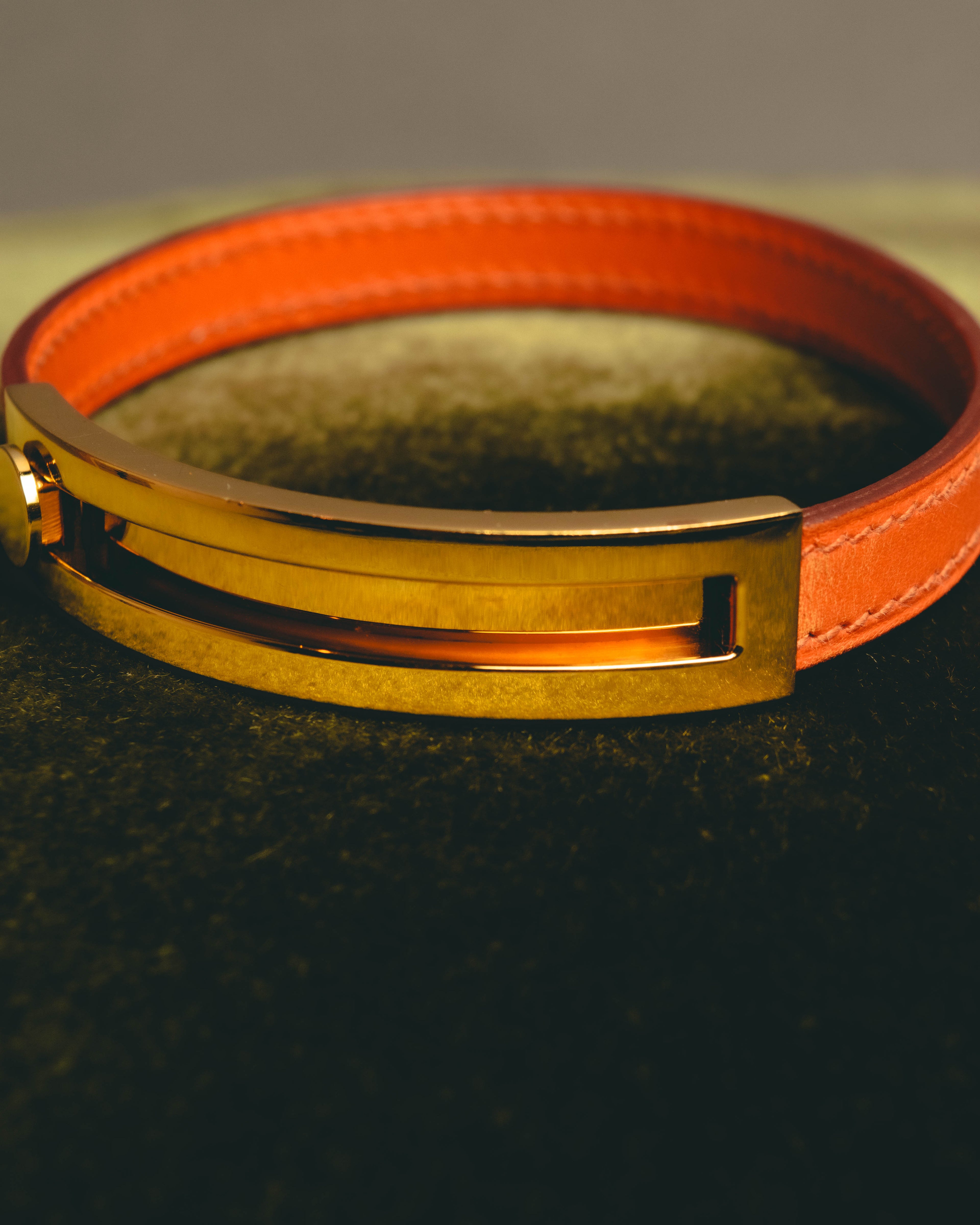 "Hermès" 00's Vibrant orange leather bracelet