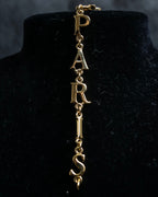 "Christian Dior" DIOR＆PARIS motif gold bracelet