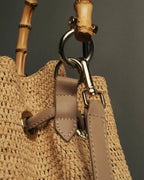 “Heidi Klein” Natural raffia bamboo handle bucket bag