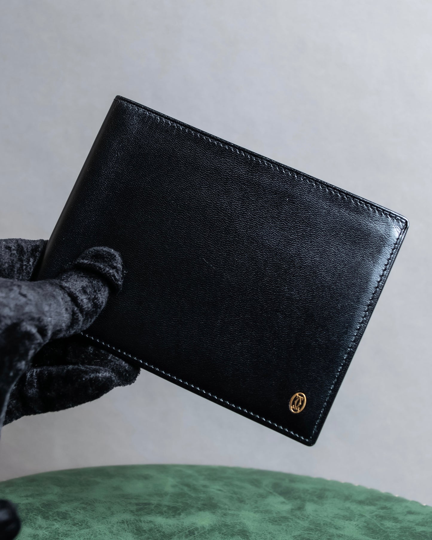 "Cartier" 2C logo engraved leather bi-fold wallet