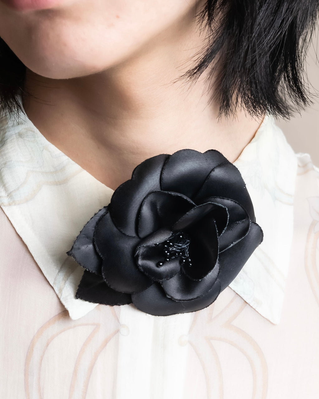 "CHANEL" Black camellia motif brooch