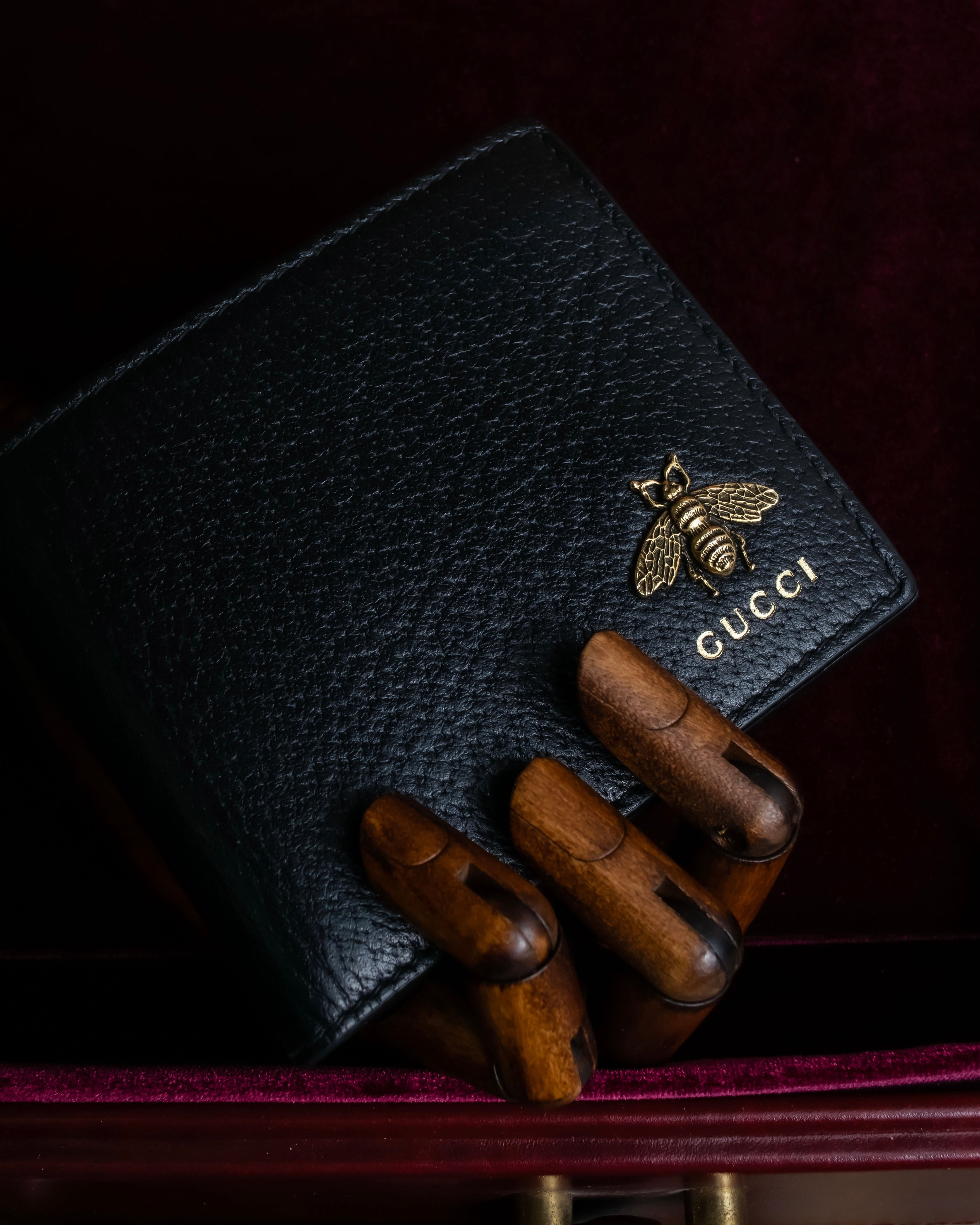 "GUCCI" Gold bee motif animalier bi-fold leather wallet