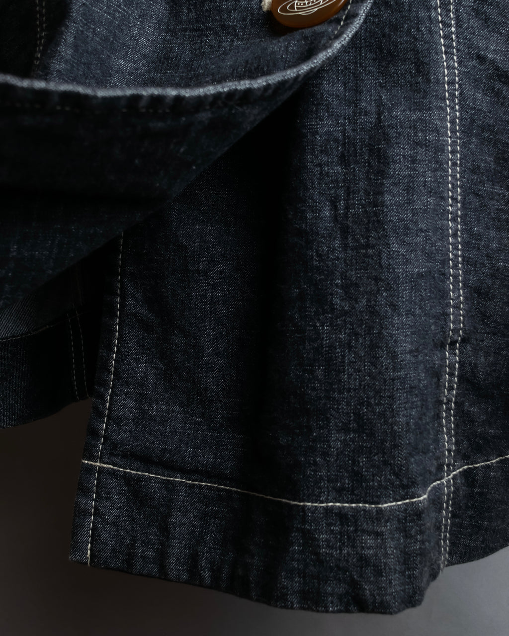 "Vivienne Westwood RED LABEL" Asymmetrical button design mid length denim coat