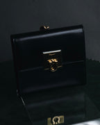 "Salvatore Ferragamo" 90’s Gancini clasp kiss lock tri fold wallet