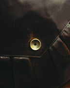 “Yves Saint Laurent” 70’s-80’s Perforated logo leather tassel shoulder bag