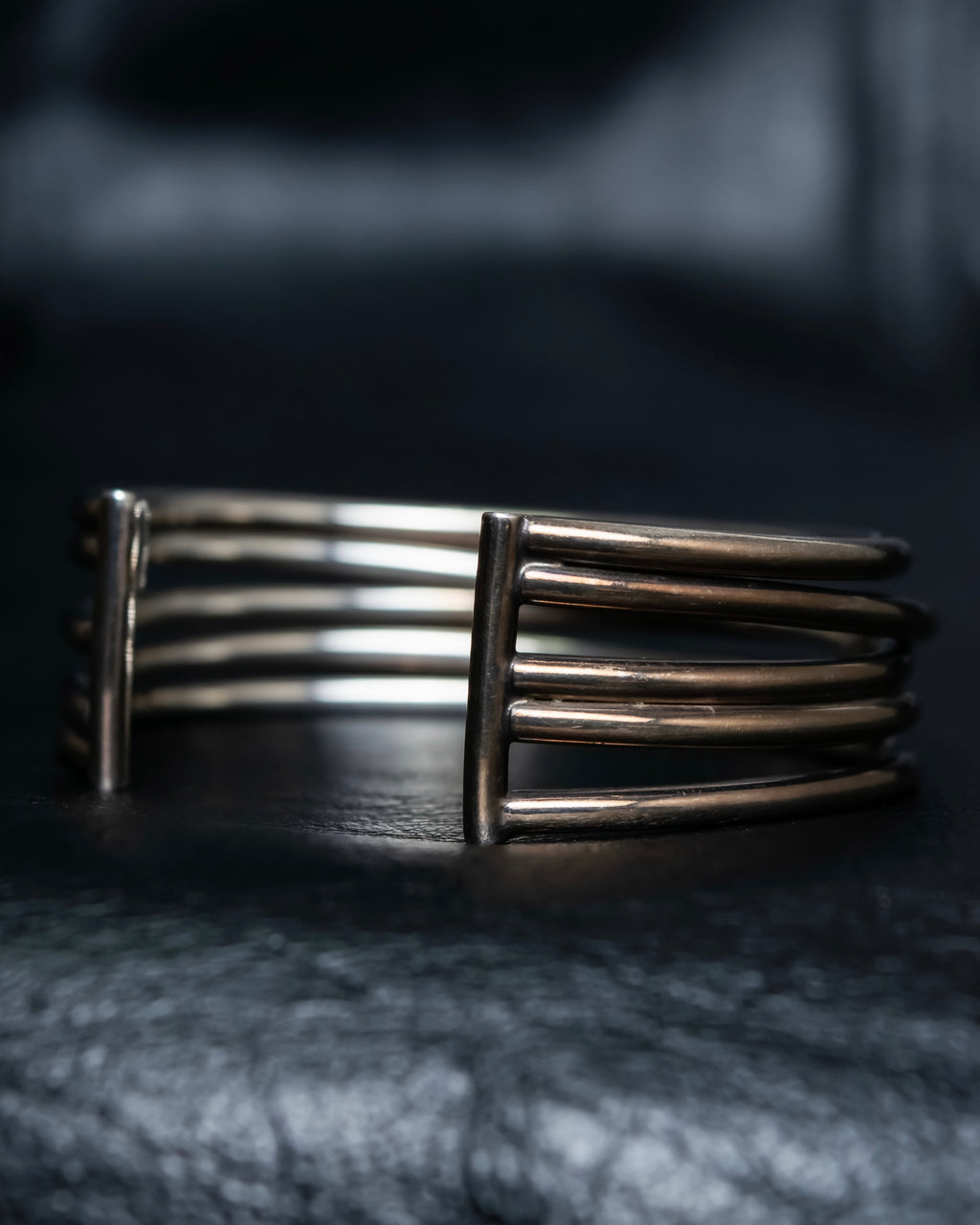 “PHILIPPE AUDIBERT” Crossed 5 line silver bangle