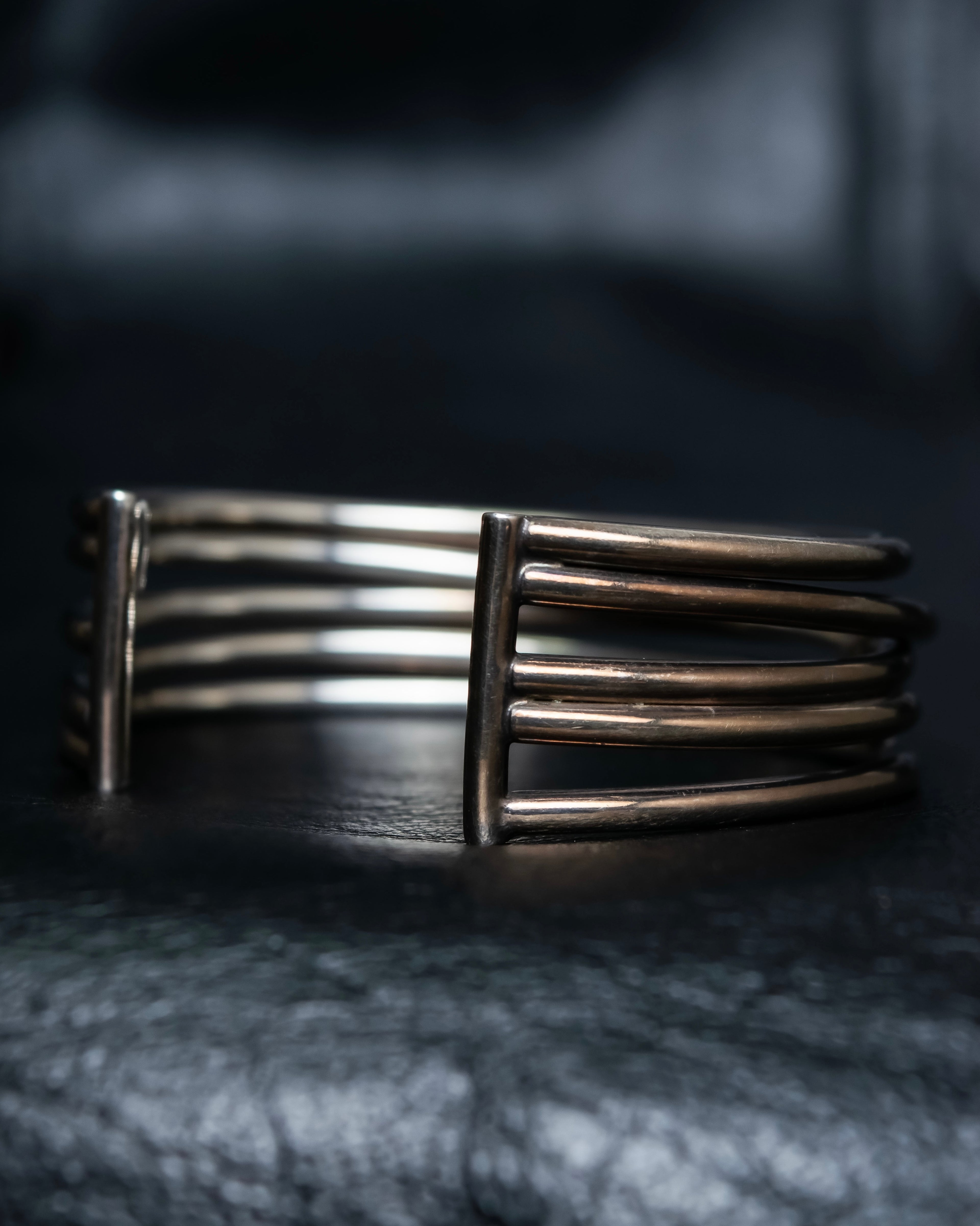 “PHILIPPE AUDIBERT” Crossed 5 line silver bangle