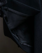 "JOHN LAWRENCE SULLIVAN"
 Large lapel double-breasted mid length coat