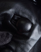 "MATÉRIEL TBILISI" Draped belted synthetic leather long jacket