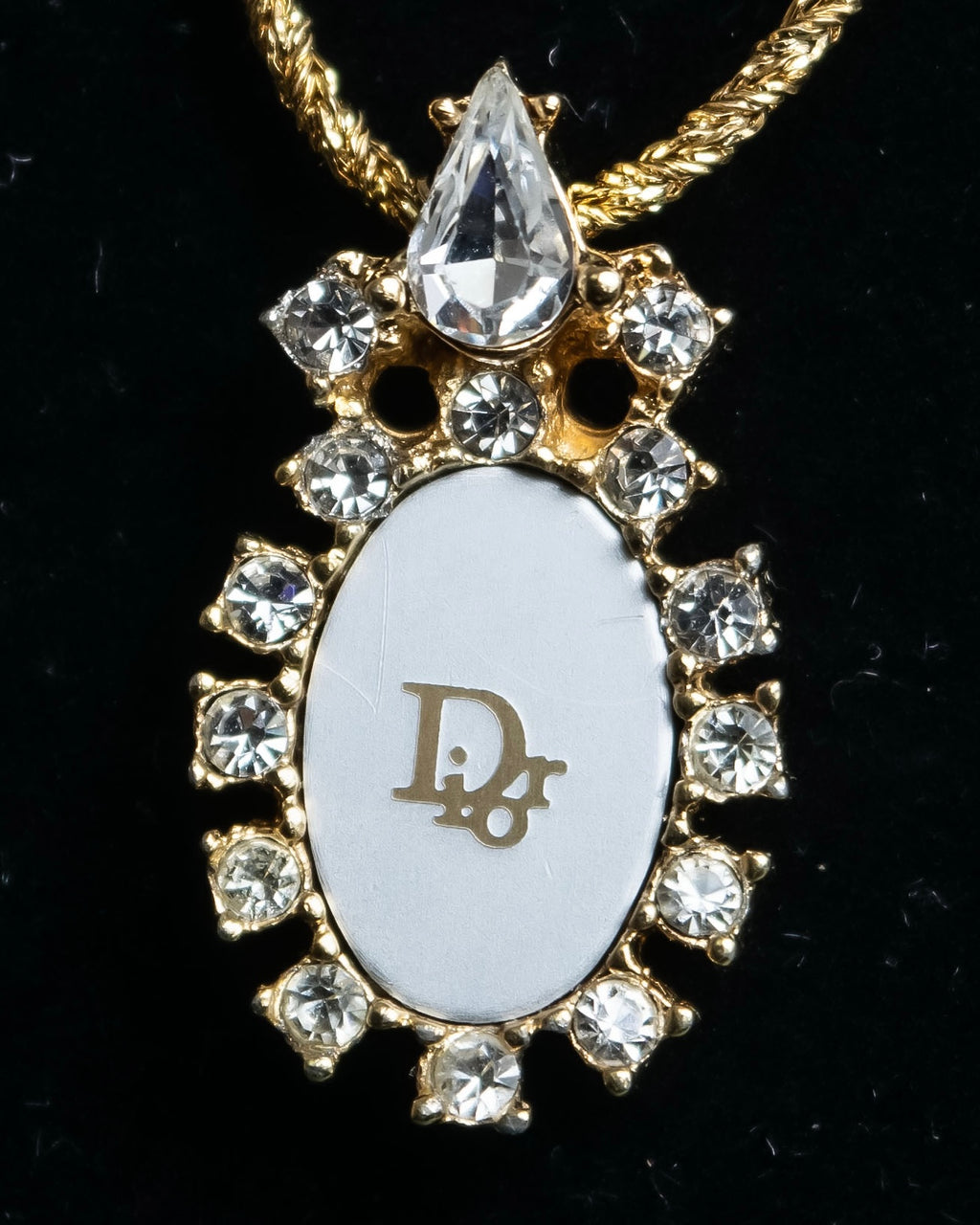 "Christian Dior" Trotter logo engraved gold pendan