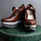 "PRADA" Brown leather stepped sole wedge heel pumps