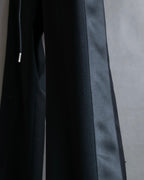"sacai" Satin line design tapered slacks