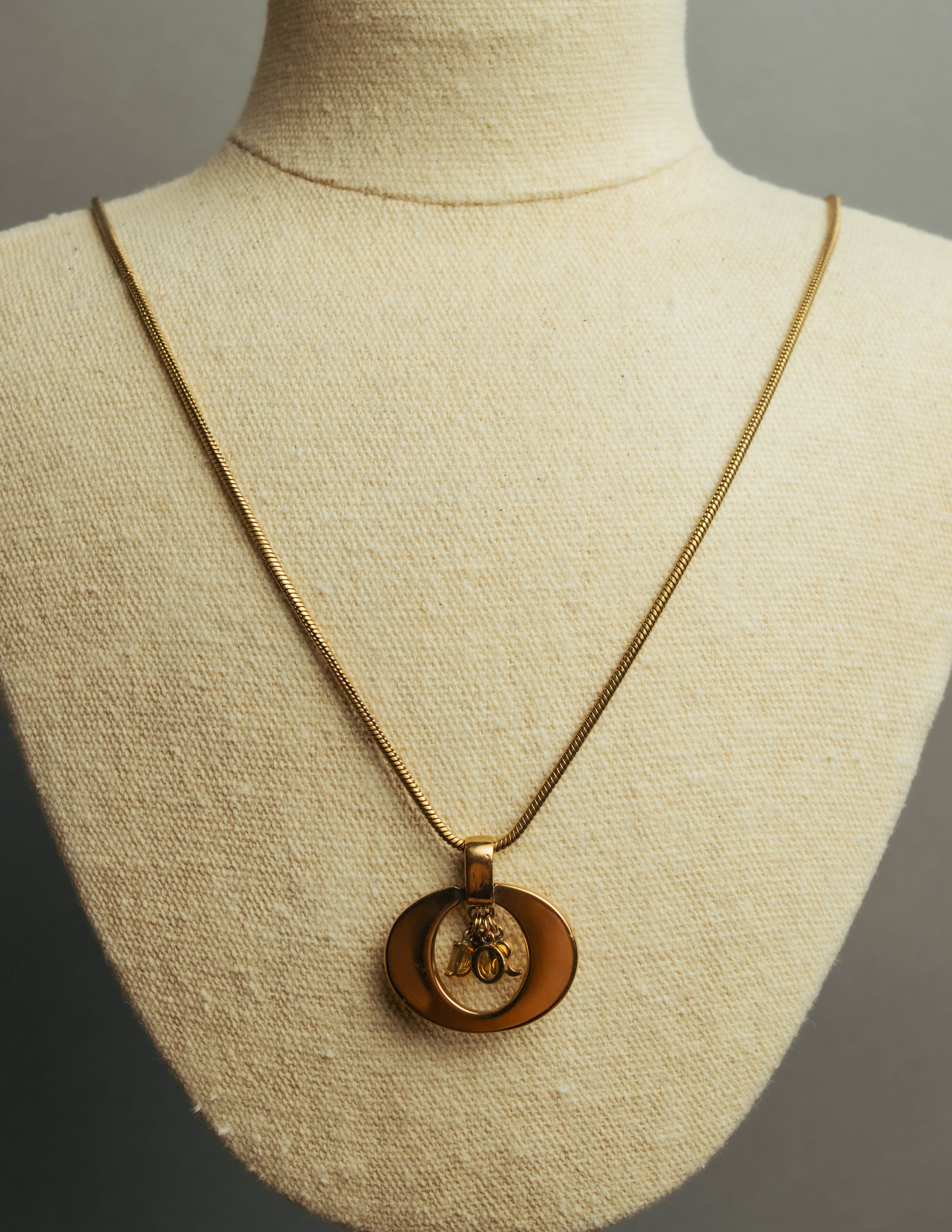 "Christian Dior" 80's-90's Gold logo pendant necklace