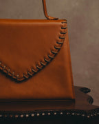 "Yves Saint Laurent" 70's-80's Cognac leather top handle bag