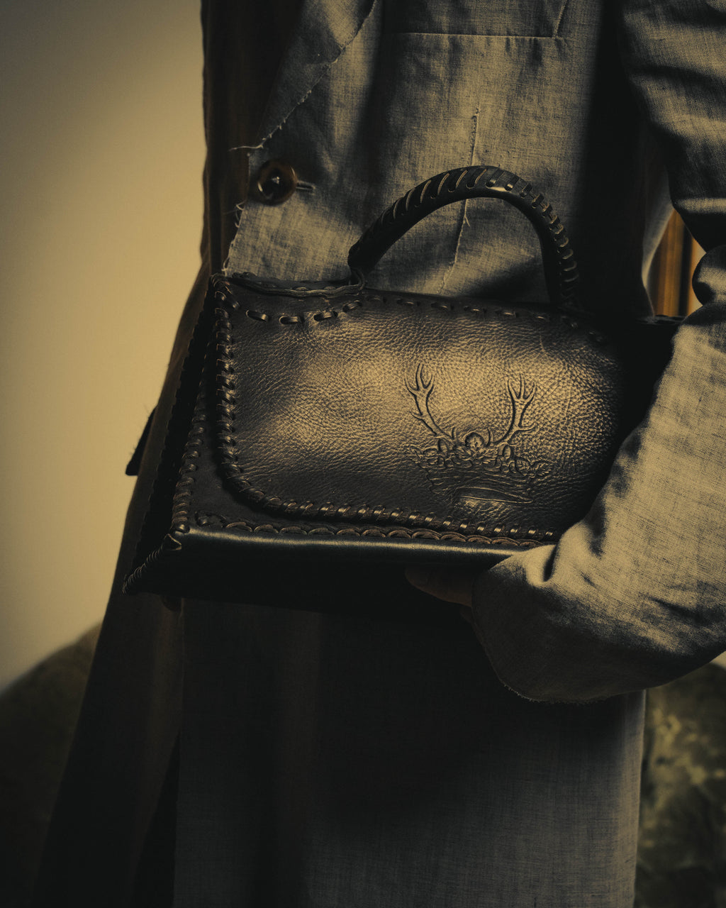 -SPECIAL- “FENDI” 80’s-90’s Coat of arms embossed whipstitched leather handbag