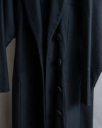 Tight-waisted wool shirt and black coat